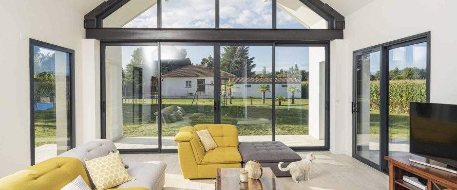 Instalación de ventanas K·LINE en Barcelona Kline ventans puertas aluminio cabecera luz 938x391 - Instalación de ventanas K·LINE en Barcelona